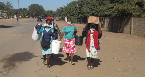 Chiredzi, Zimbabwe,03 June 2020,Group of women with face masks. Copyright: Shutterstock